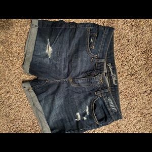 Distressed dark wash jean shorts
